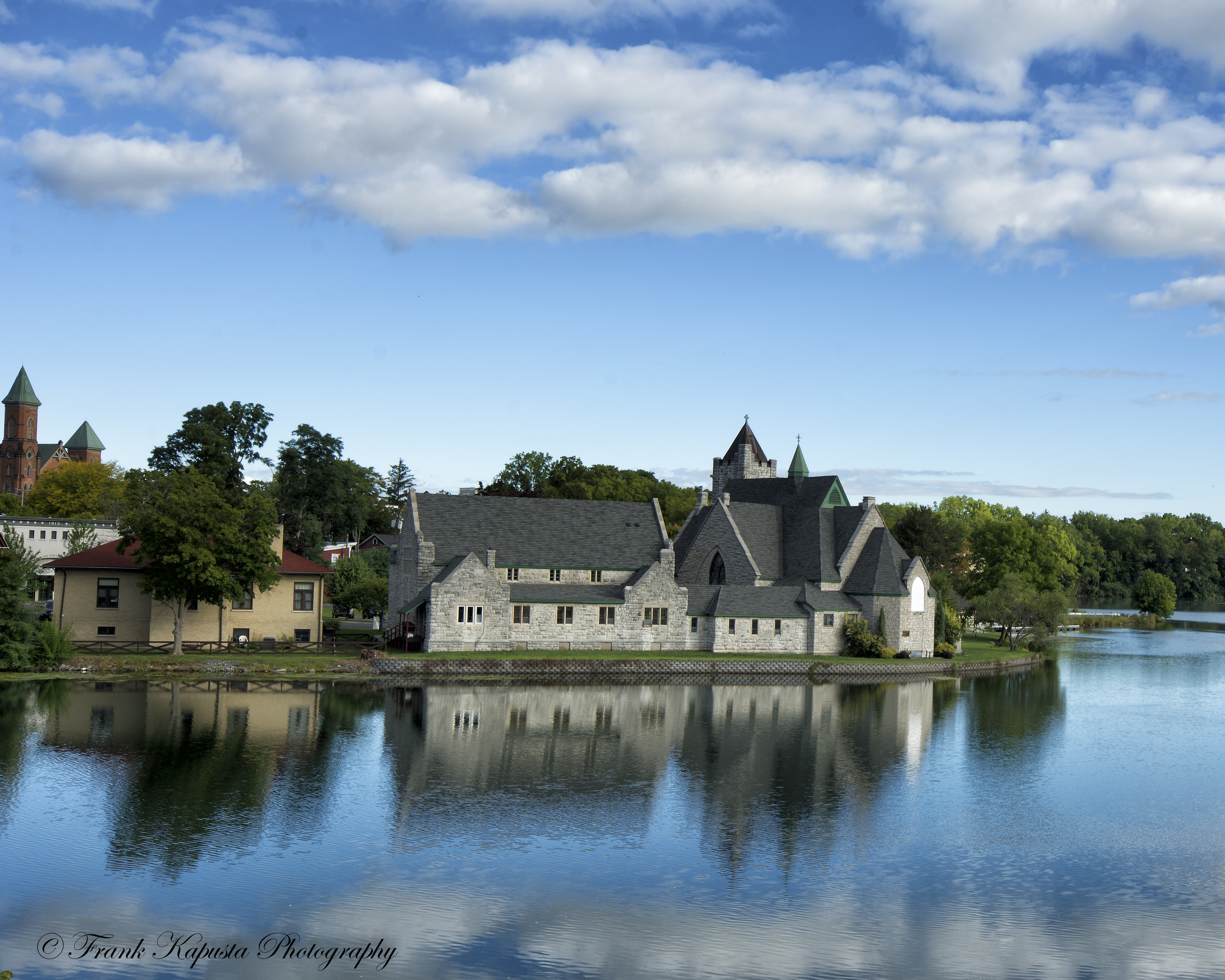 After 50 years, the new Trinity Episcopal Church was built across the canal in 1885. The limestone used came from Fayette and Onondaga, NY. Seneca Falls, NY